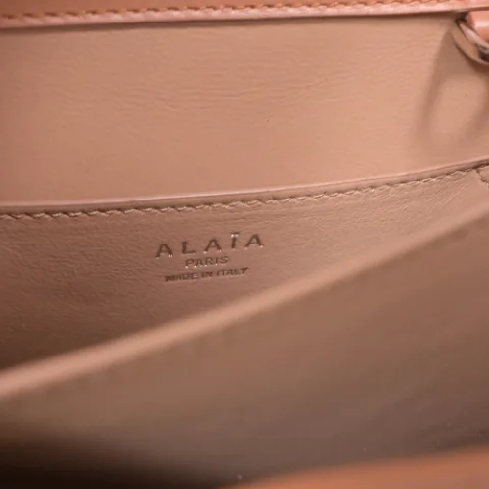 Alaïa Pre-owned Leather handbags Brown Dames