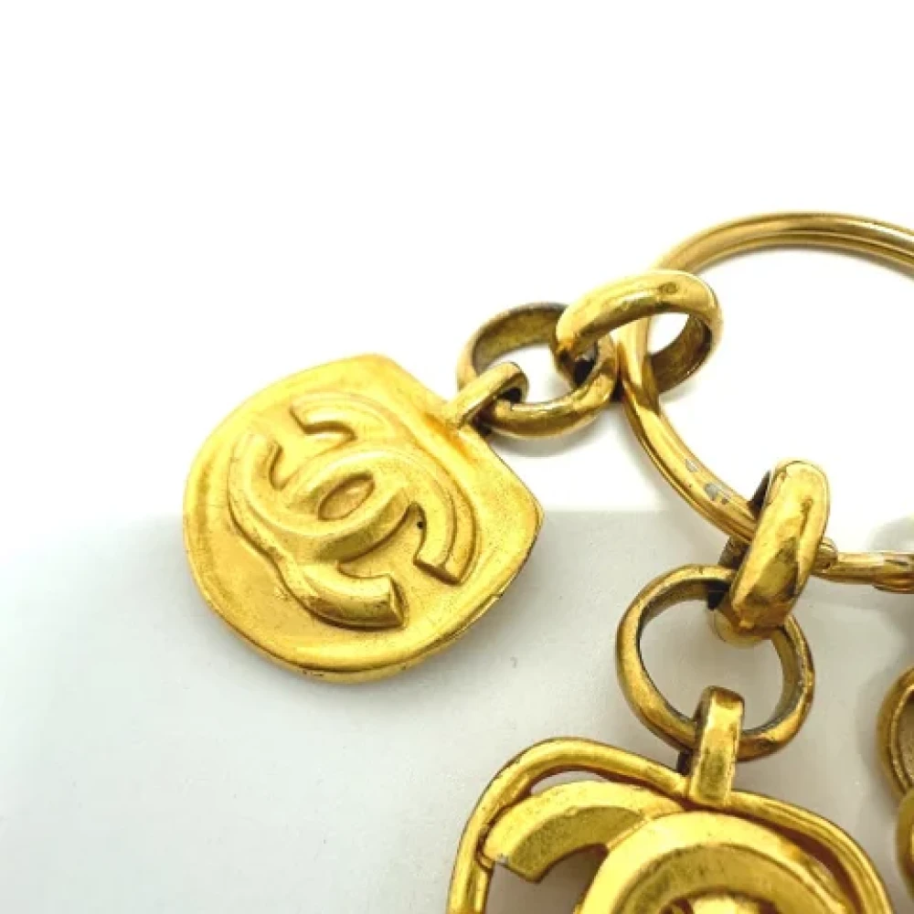 Chanel Vintage Pre-owned Metal key-holders Yellow Dames