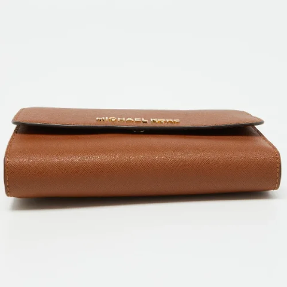 Michael Kors Pre-owned Leather wallets Brown Dames
