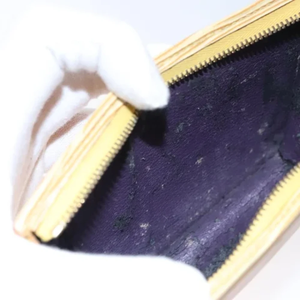 Louis Vuitton Vintage Pre-owned Leather pouches Yellow Dames