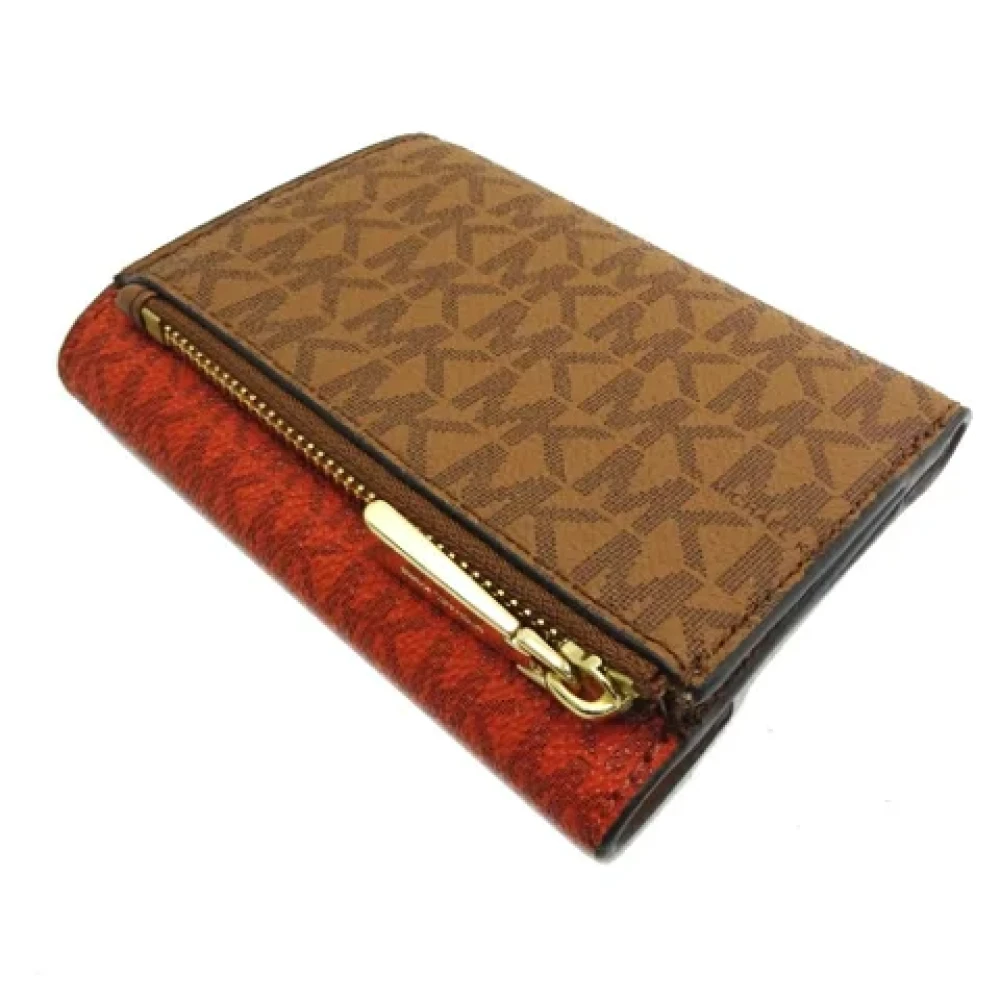 Michael Kors Pre-owned Canvas wallets Brown Dames
