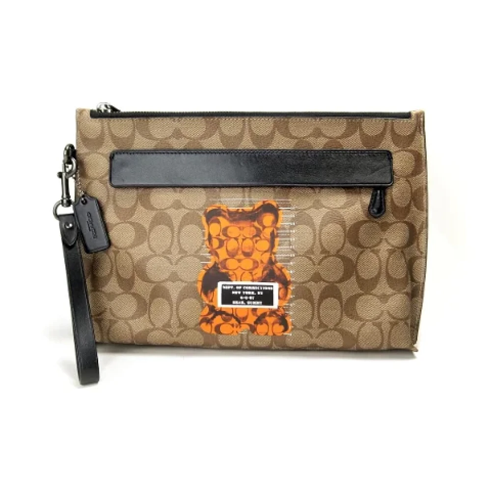 Coach Pre-owned Canvas clutches Brown Dames
