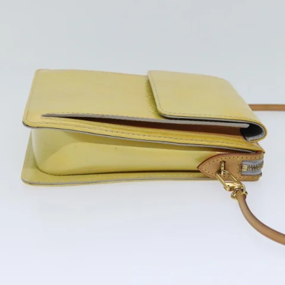 Louis Vuitton Vintage Pre-owned Fabric clutches Yellow Dames