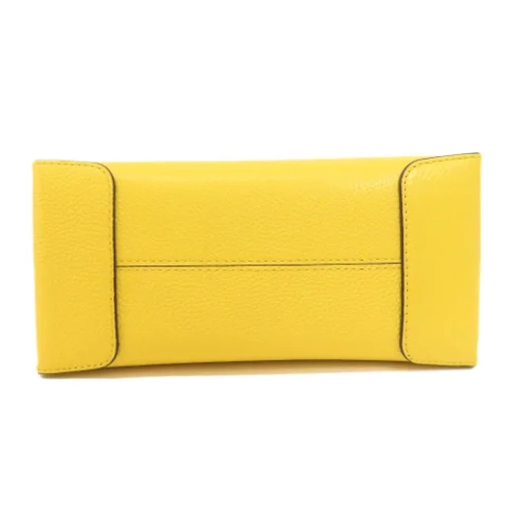 Michael Kors Pre-owned Fabric handbags Yellow Dames