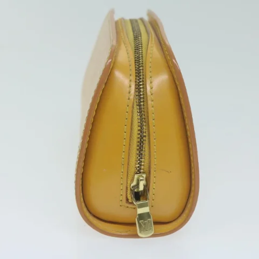 Louis Vuitton Vintage Pre-owned Leather pouches Yellow Dames