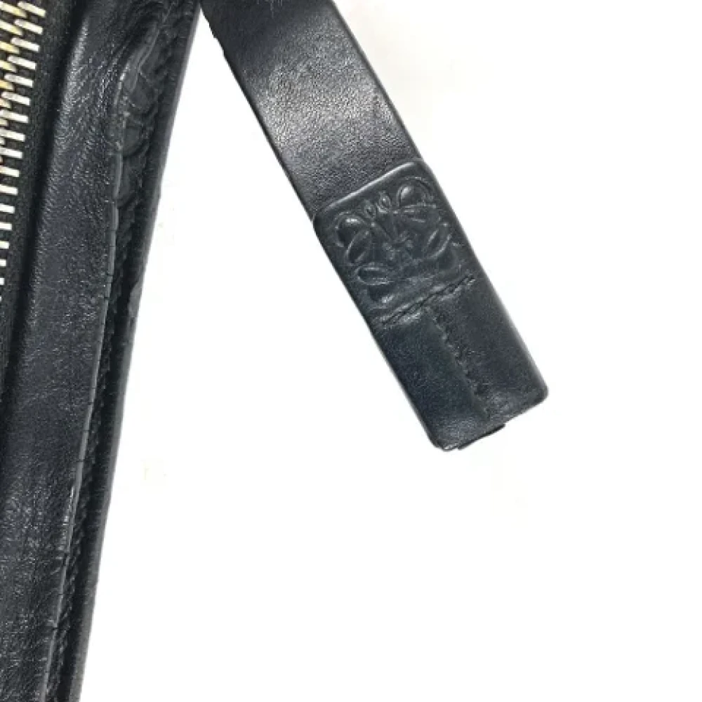 Loewe Pre-owned Leather clutches Black Heren