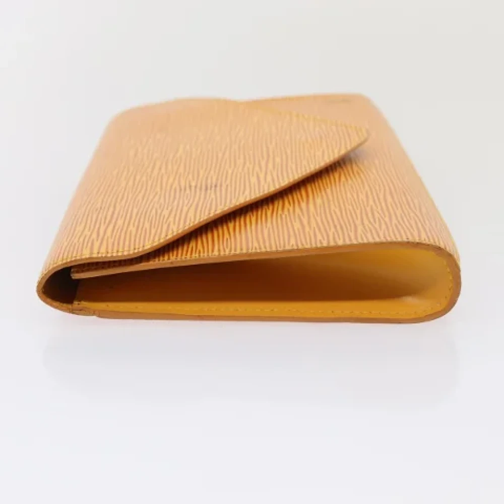 Louis Vuitton Vintage Pre-owned Leather clutches Yellow Dames
