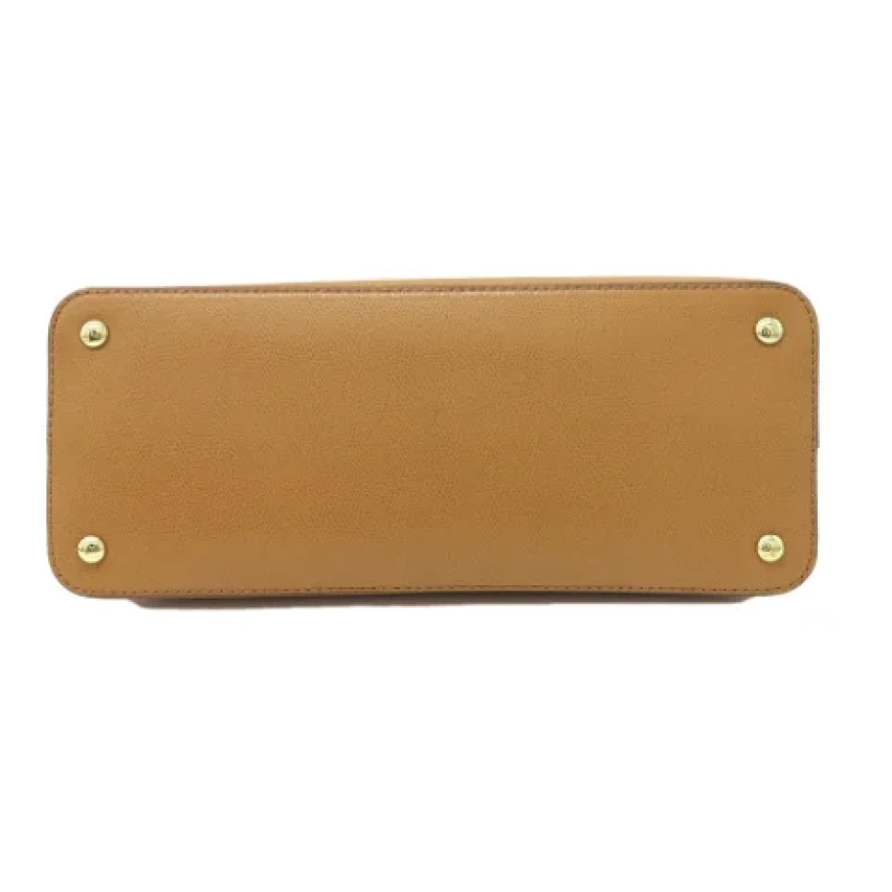 Michael Kors Pre-owned Plastic totes Brown Dames