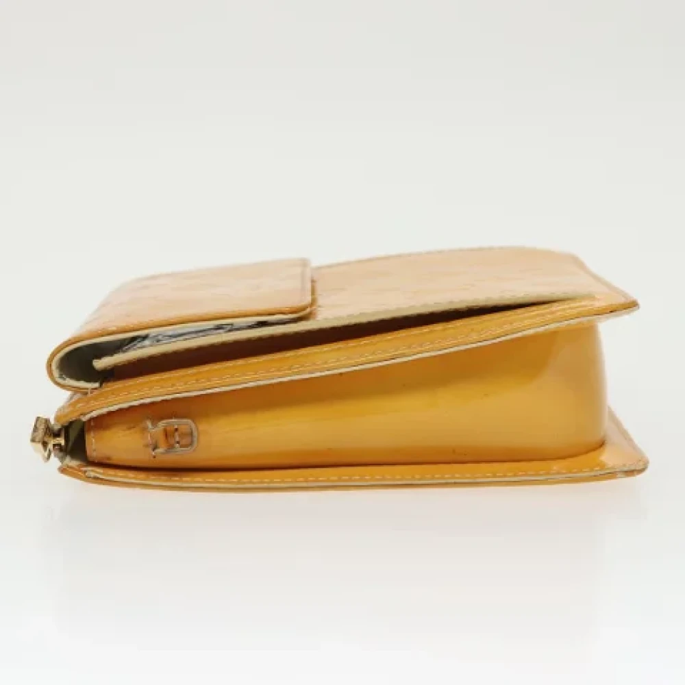 Louis Vuitton Vintage Pre-owned Leather clutches Yellow Dames