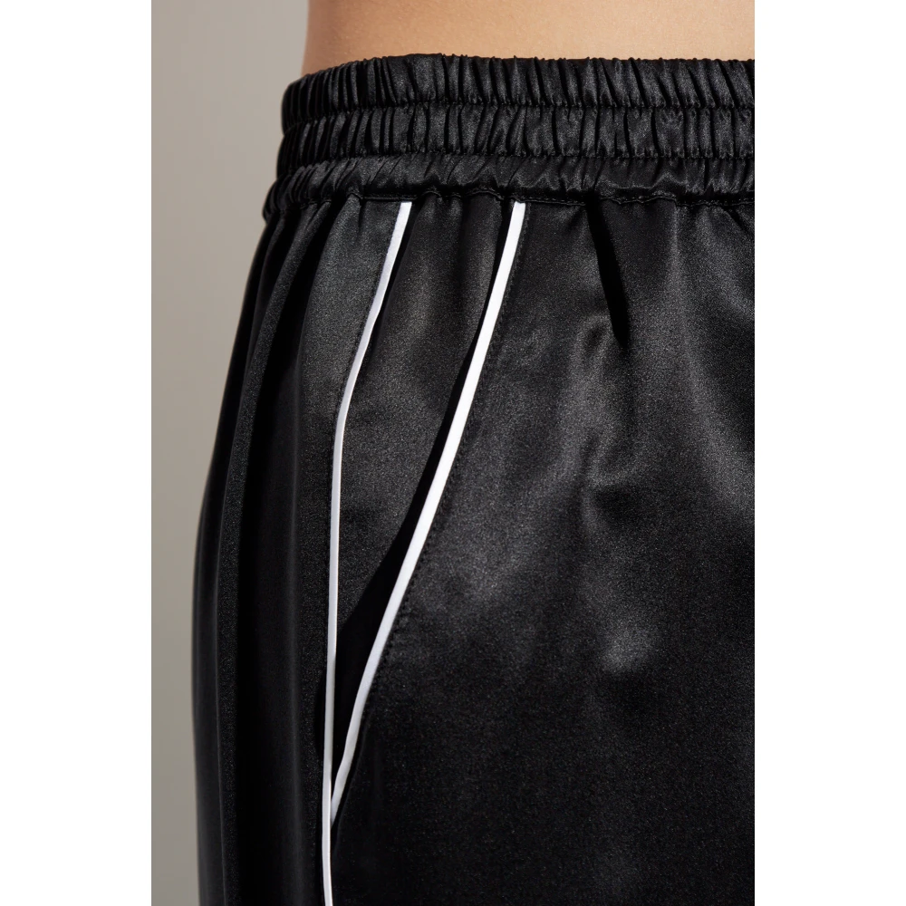 Dolce & Gabbana Zijden broek met wijde pijpen Black Dames