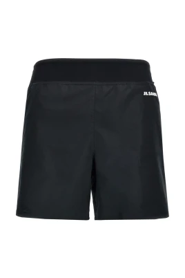 Svarta badshorts med logodetalj