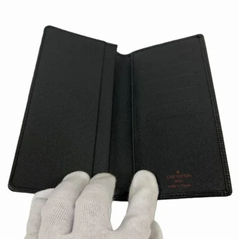 Louis Vuitton Vintage Pre-owned Leather wallets Black Heren