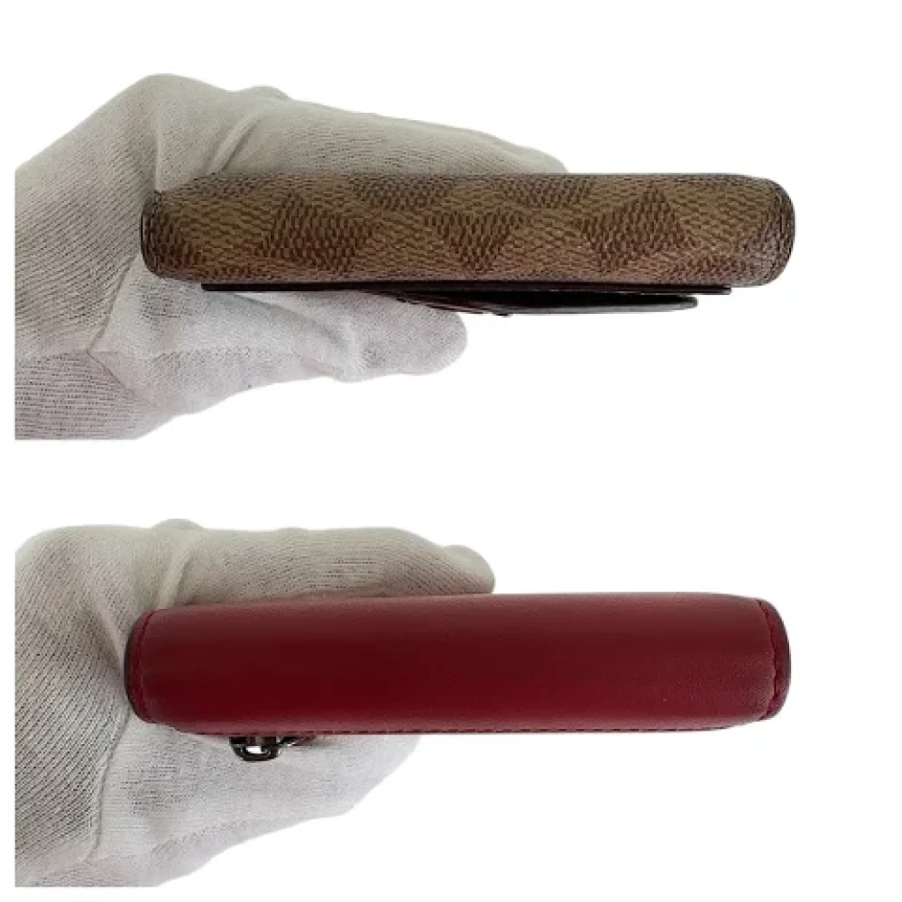 Coach Pre-owned Plastic wallets Red Dames