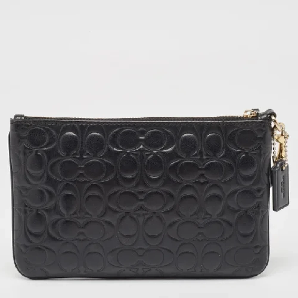 Coach Pre-owned Leather clutches Black Dames