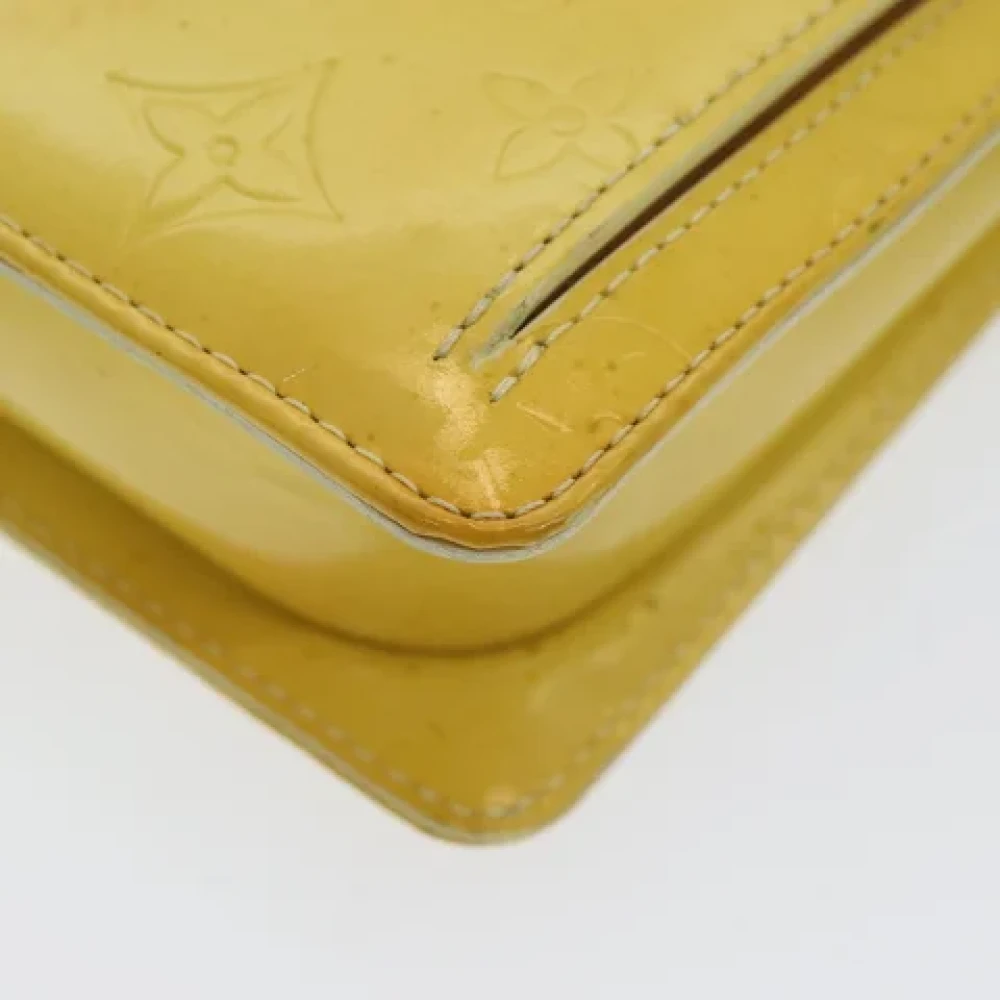 Louis Vuitton Vintage Pre-owned Leather clutches Yellow Dames