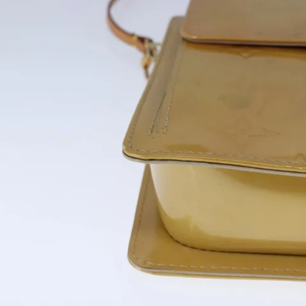 Louis Vuitton Vintage Pre-owned Leather clutches Beige Dames