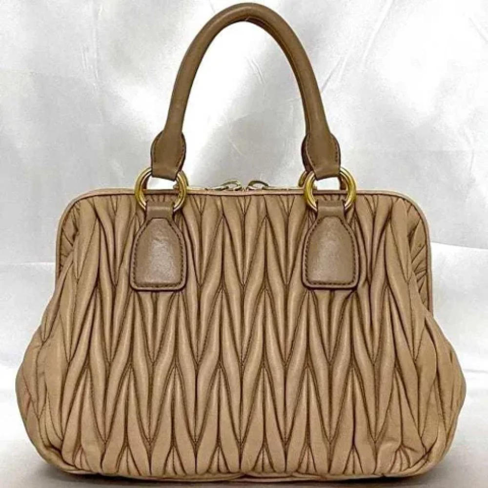 Miu Pre-owned Leather handbags Beige Dames