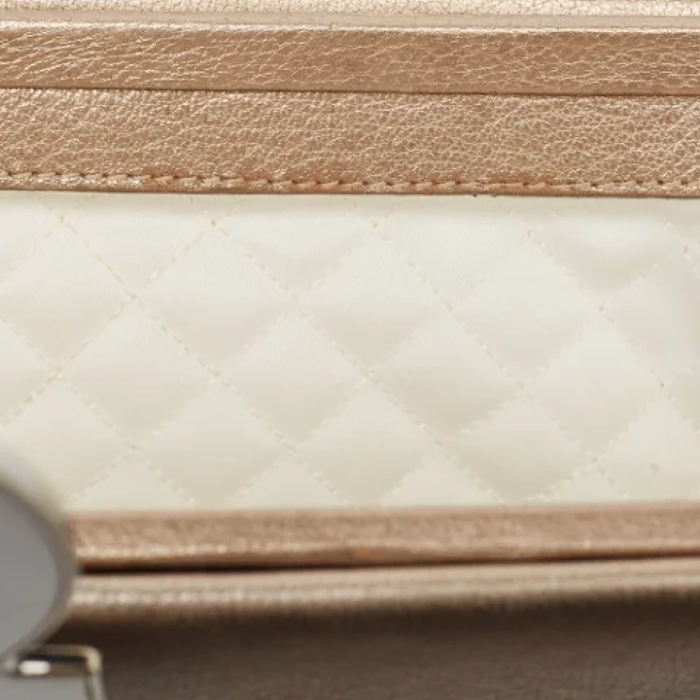 Salvatore Ferragamo Pre-owned Leather clutches Beige Dames