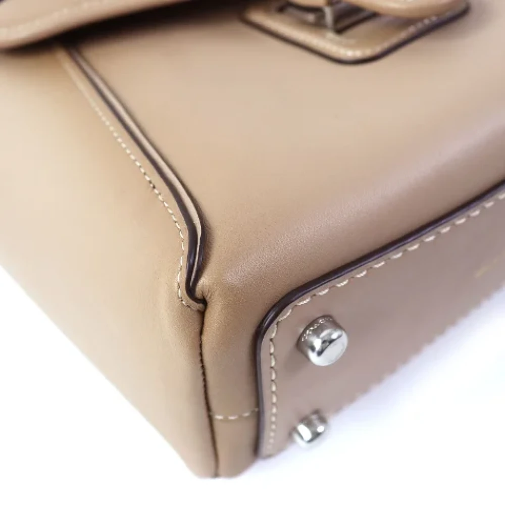 Coach Pre-owned Leather handbags Beige Dames