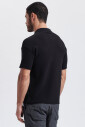 black-knitted-polo-with-raw-edge