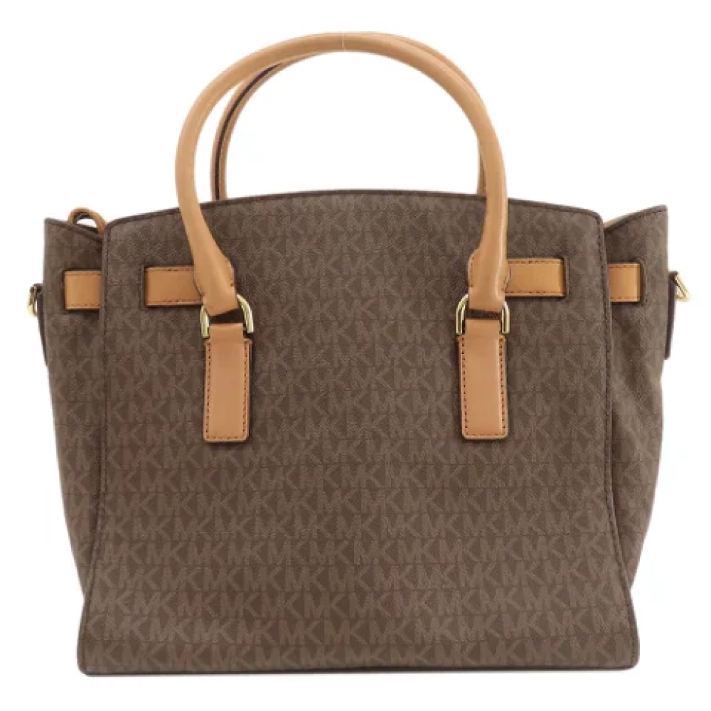 Michael Kors Pre-owned Plastic totes Brown Dames
