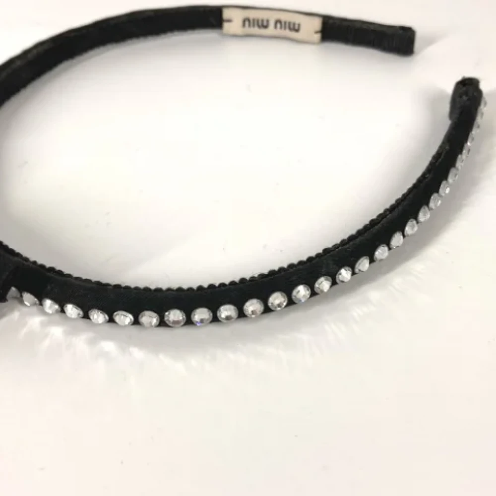 Miu Pre-owned Fabric hair-accessories Black Dames