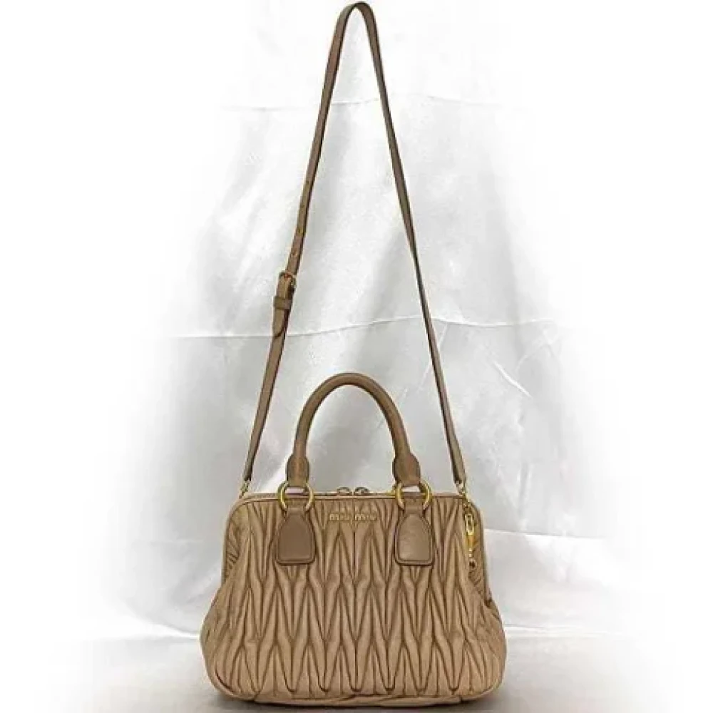 Miu Pre-owned Leather handbags Beige Dames