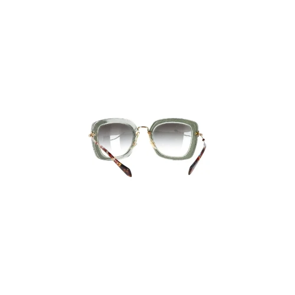 Miu Pre-owned Plastic sunglasses Gray Dames
