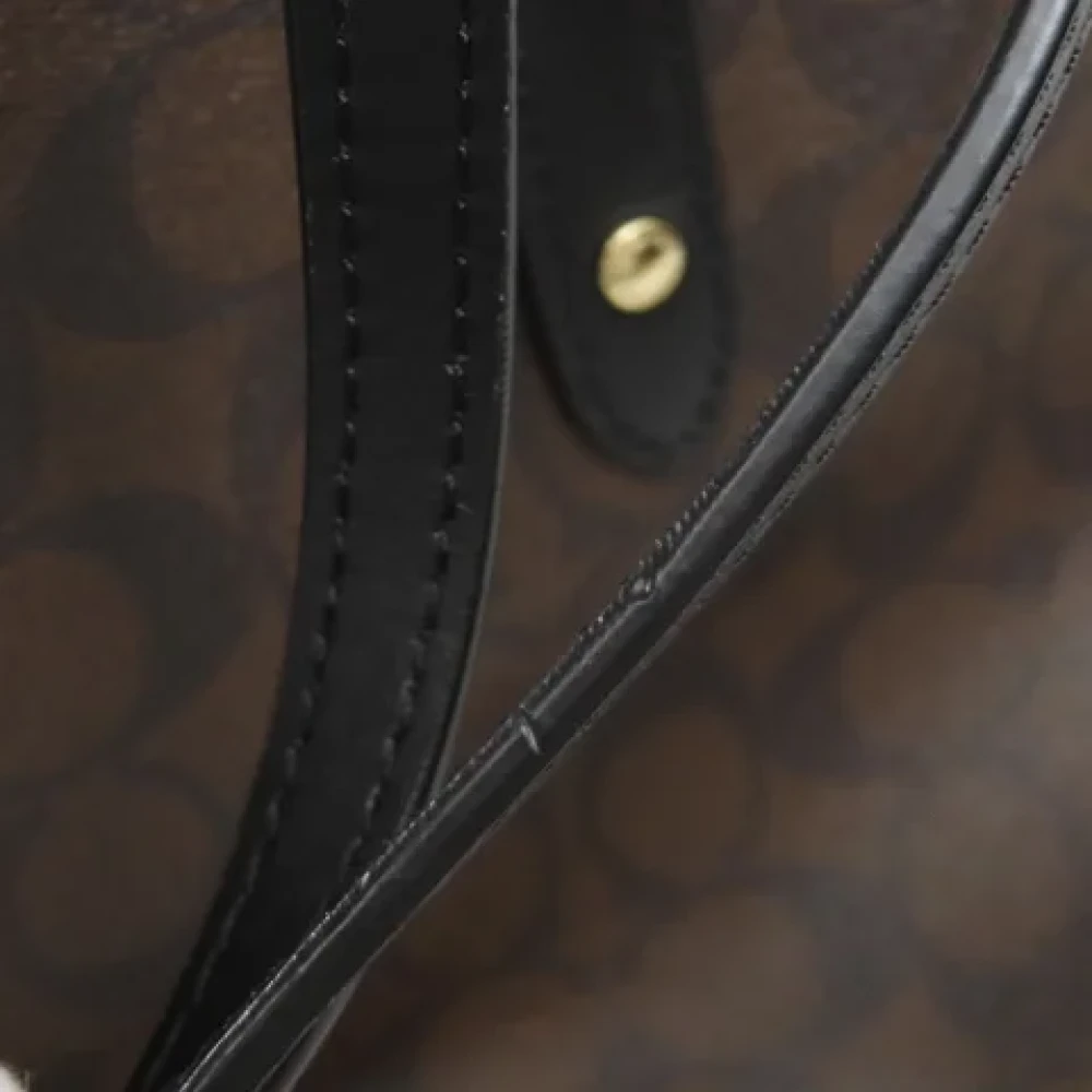 Coach Pre-owned Plastic handbags Brown Dames