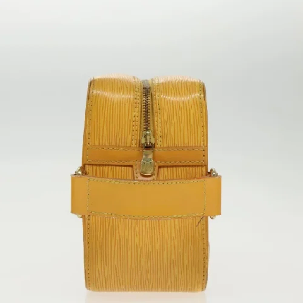 Louis Vuitton Vintage Pre-owned Leather clutches Yellow Dames
