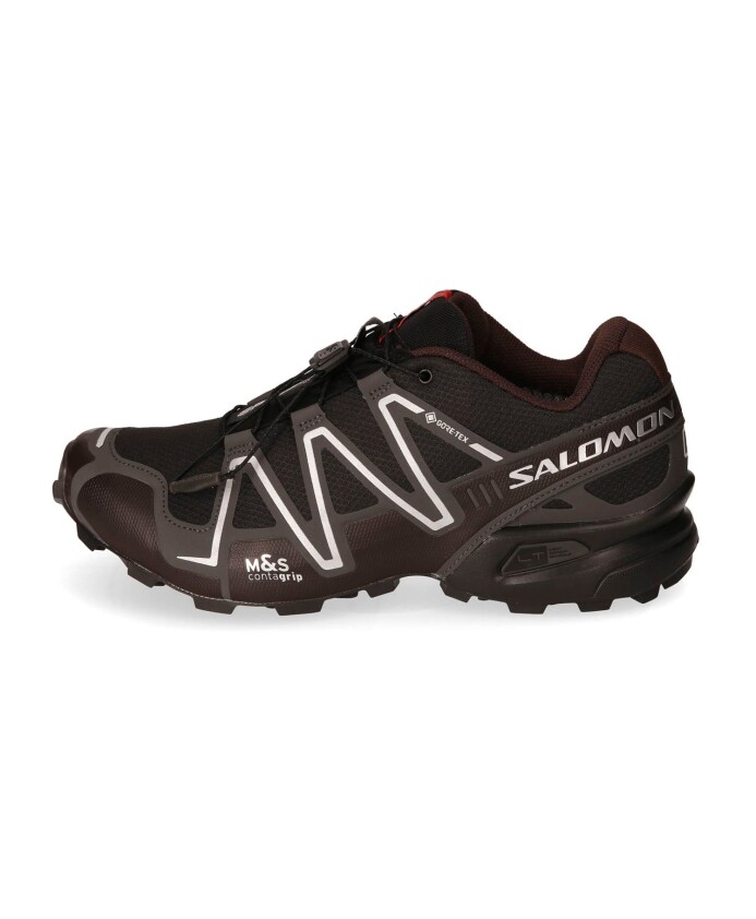 chaussure-de-trail-running-avec-adherence-a-la-boue