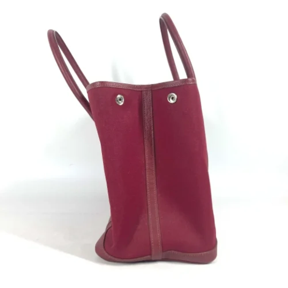 Hermès Vintage Pre-owned Fabric shoulder-bags Red Dames