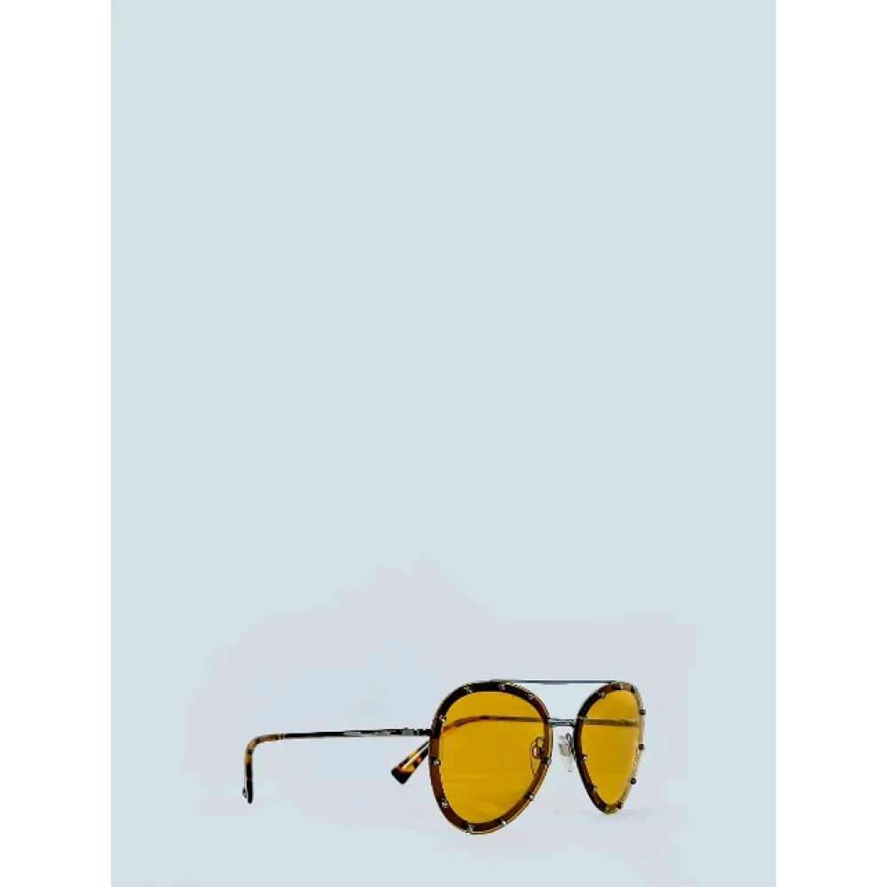 Valentino Vintage Pre-owned Metal sunglasses Yellow Dames