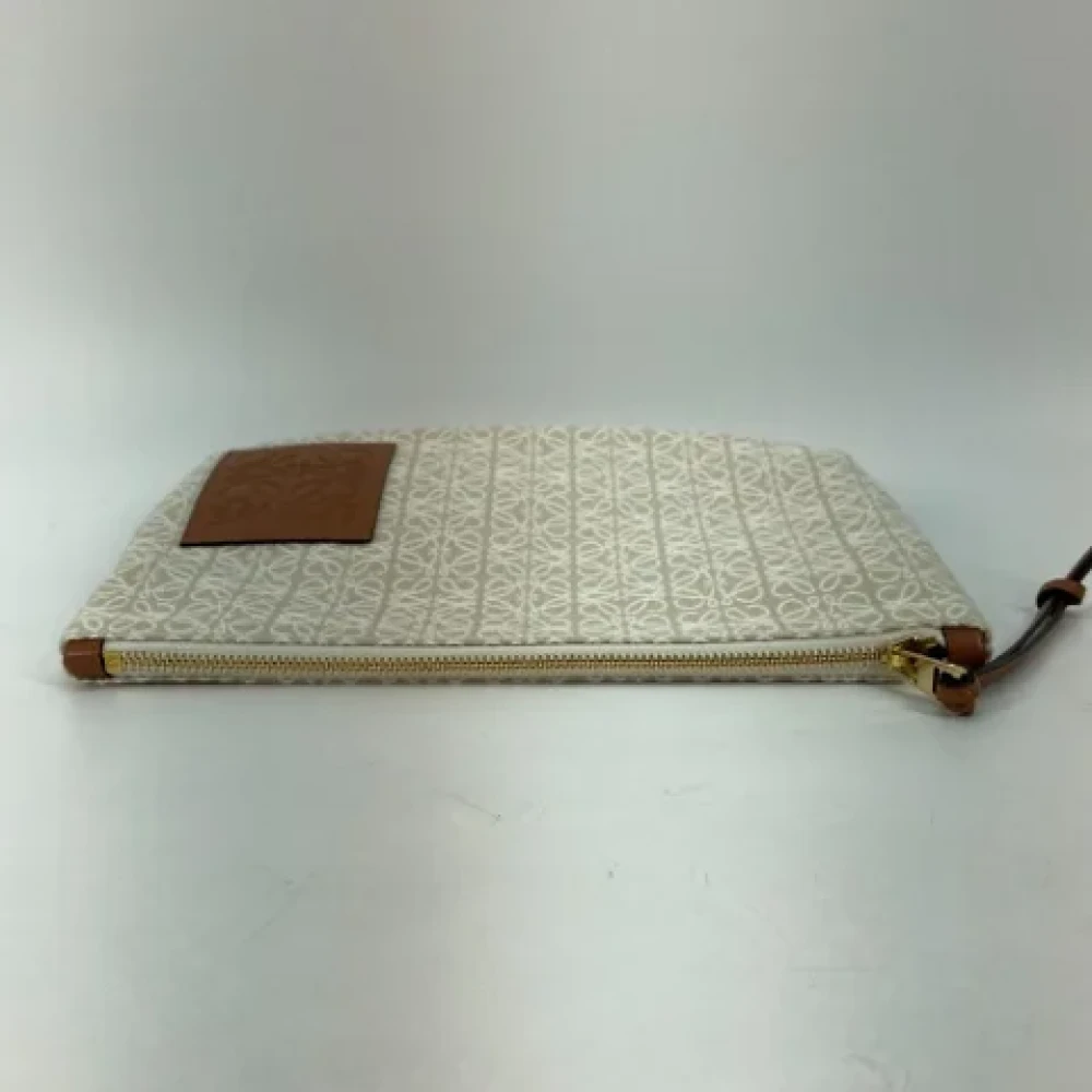 Loewe Pre-owned Fabric clutches Beige Heren