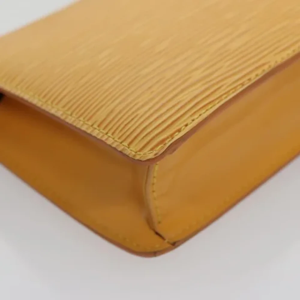 Louis Vuitton Vintage Pre-owned Leather pouches Yellow Dames