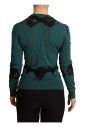pull-elegant-vert-avec-detail-en-dentelle-noire