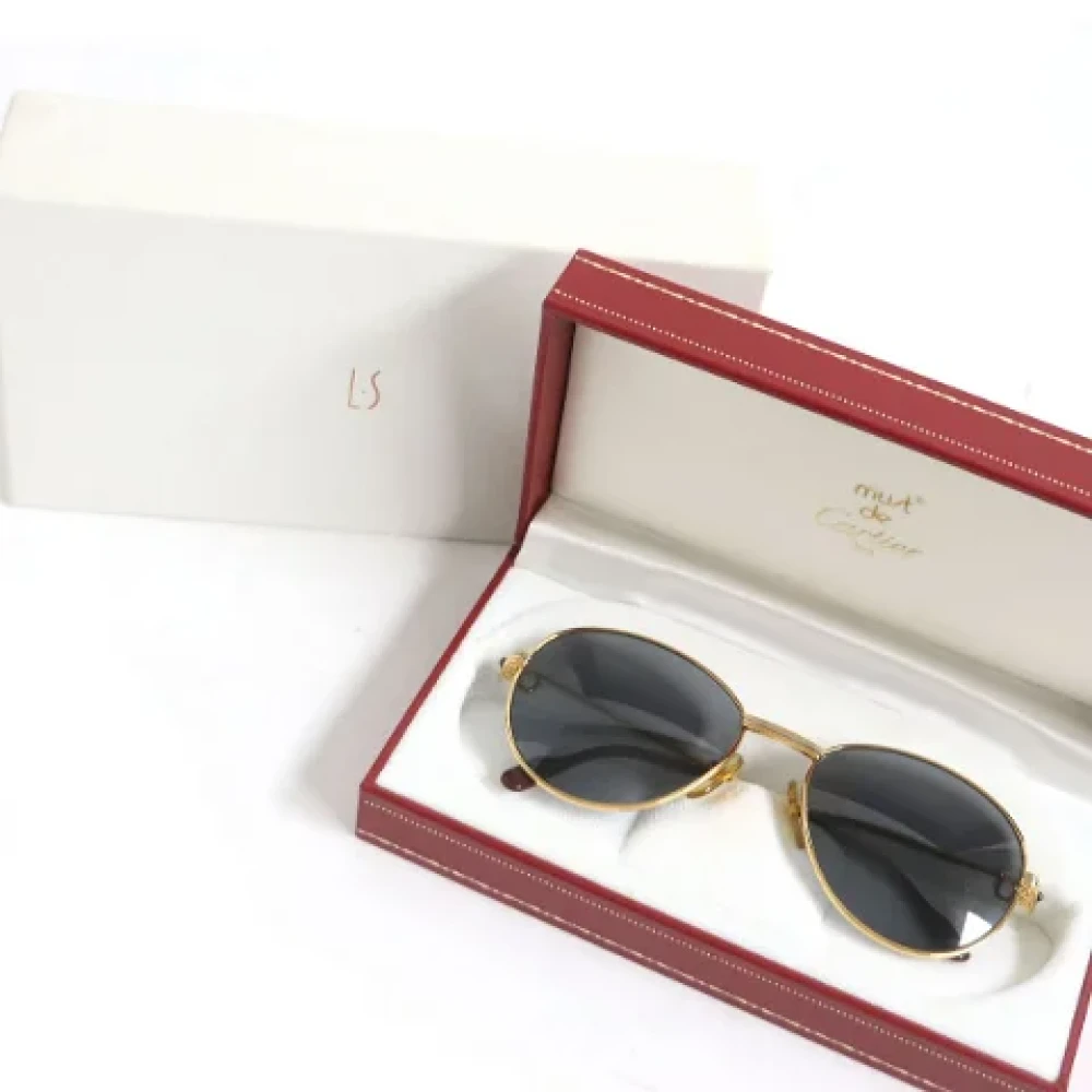 Cartier Vintage Pre-owned Glass sunglasses Yellow Dames