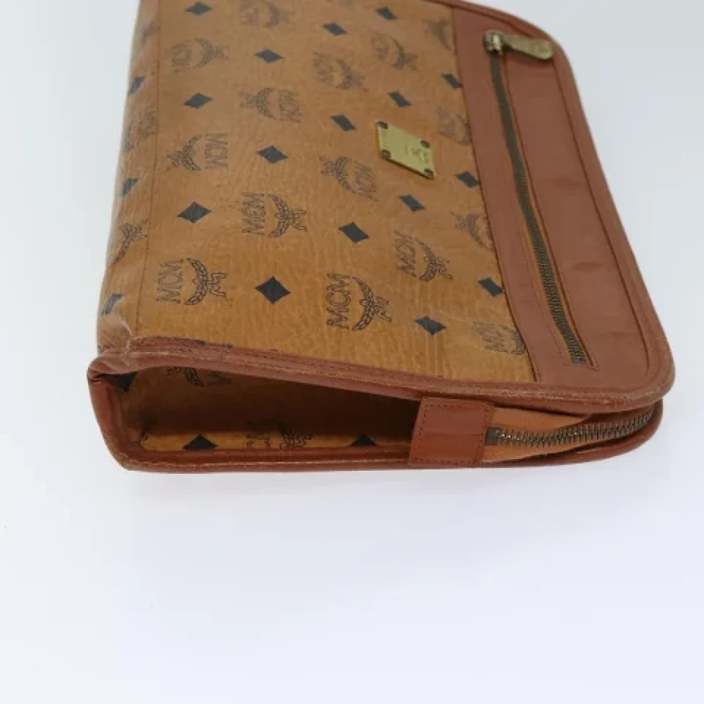 MCM Pre-owned Leather clutches Brown Dames