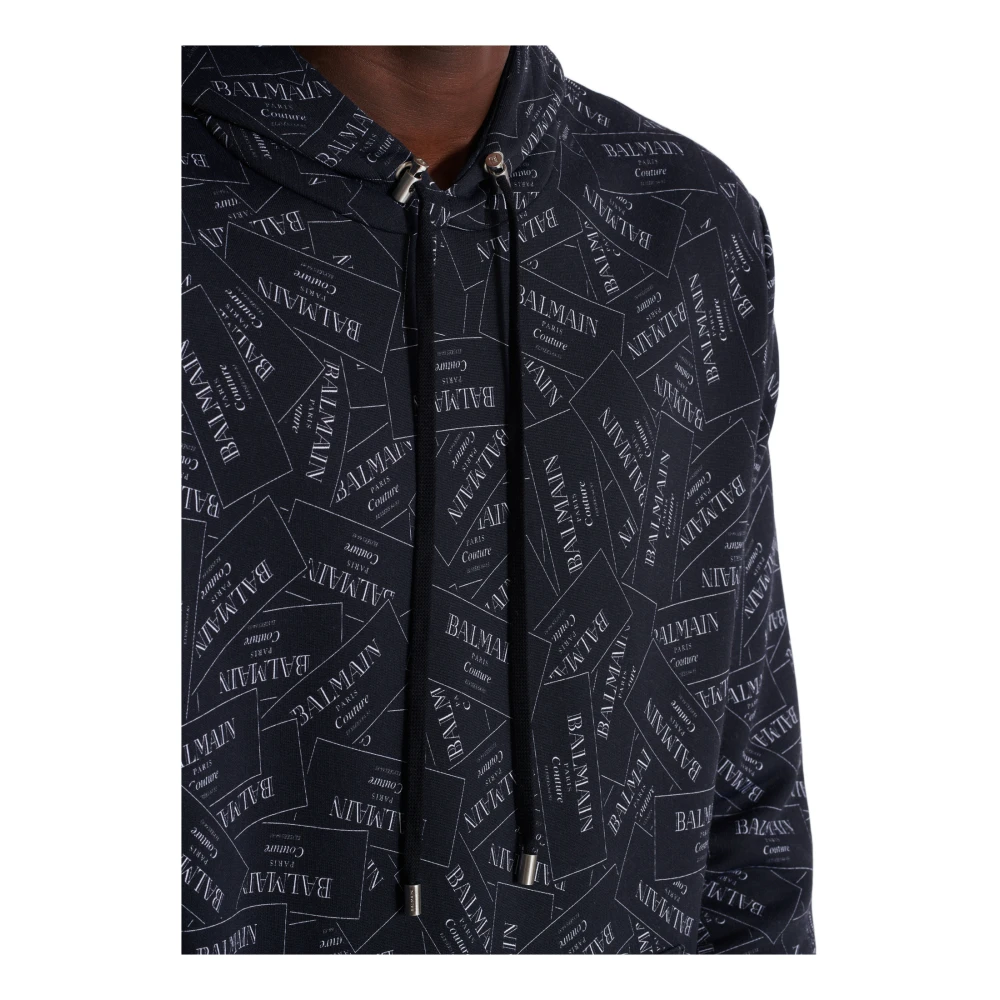 Balmain Hoodie met all-over label print Black Heren