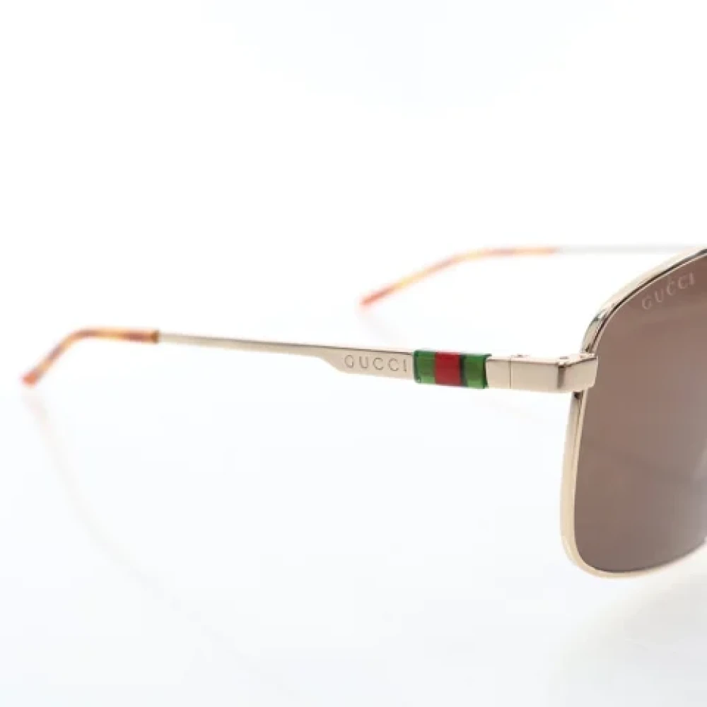 Gucci Vintage Pre-owned Metal sunglasses Yellow Dames
