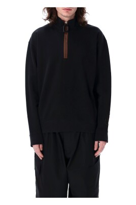 sweat-a-demi-zip-en-maille-noire-ss25