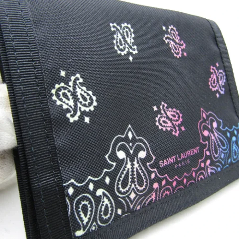 Yves Saint Laurent Vintage Pre-owned Nylon wallets Black Dames