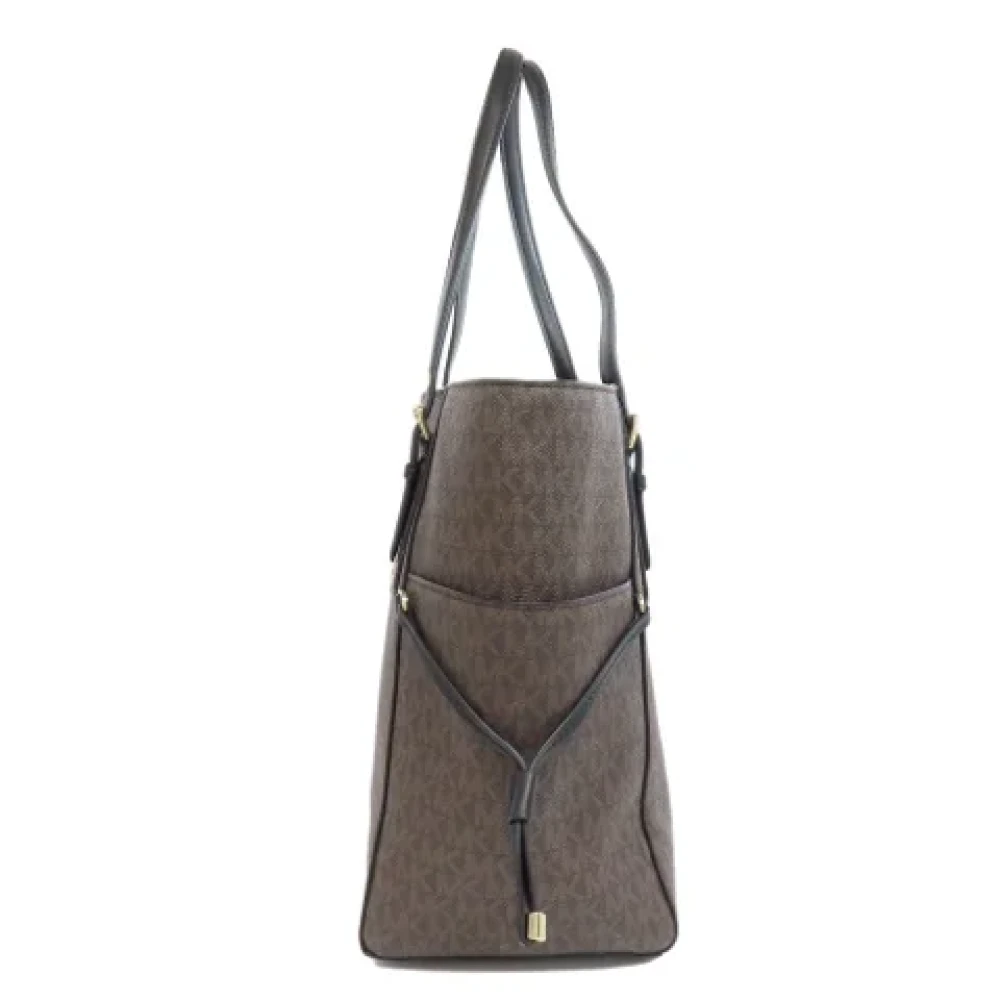 Michael Kors Pre-owned Fabric handbags Brown Dames