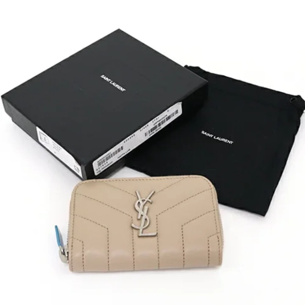 Yves Saint Laurent Vintage Pre-owned Leather wallets Beige Dames