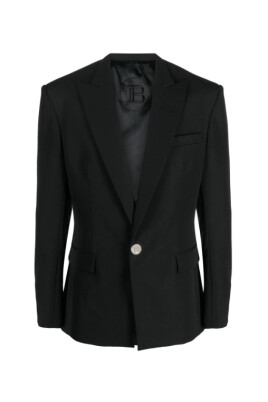 black-sweater-with-gold-button