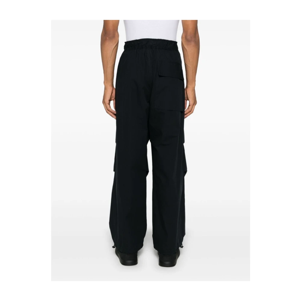 Studio Nicholson Zwarte katoenen taps toelopende broek met trekkoord Black Heren