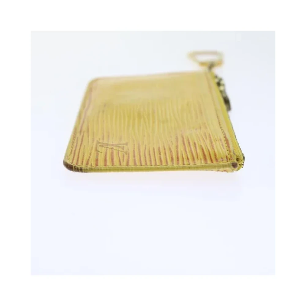 Louis Vuitton Vintage Pre-owned Leather pouches Yellow Dames