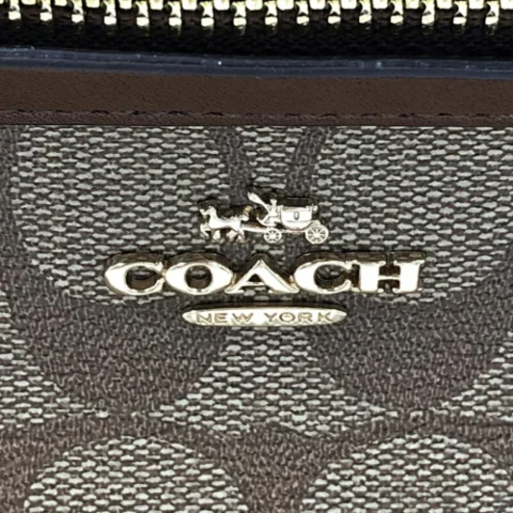 Coach Pre-owned Fabric handbags Brown Dames