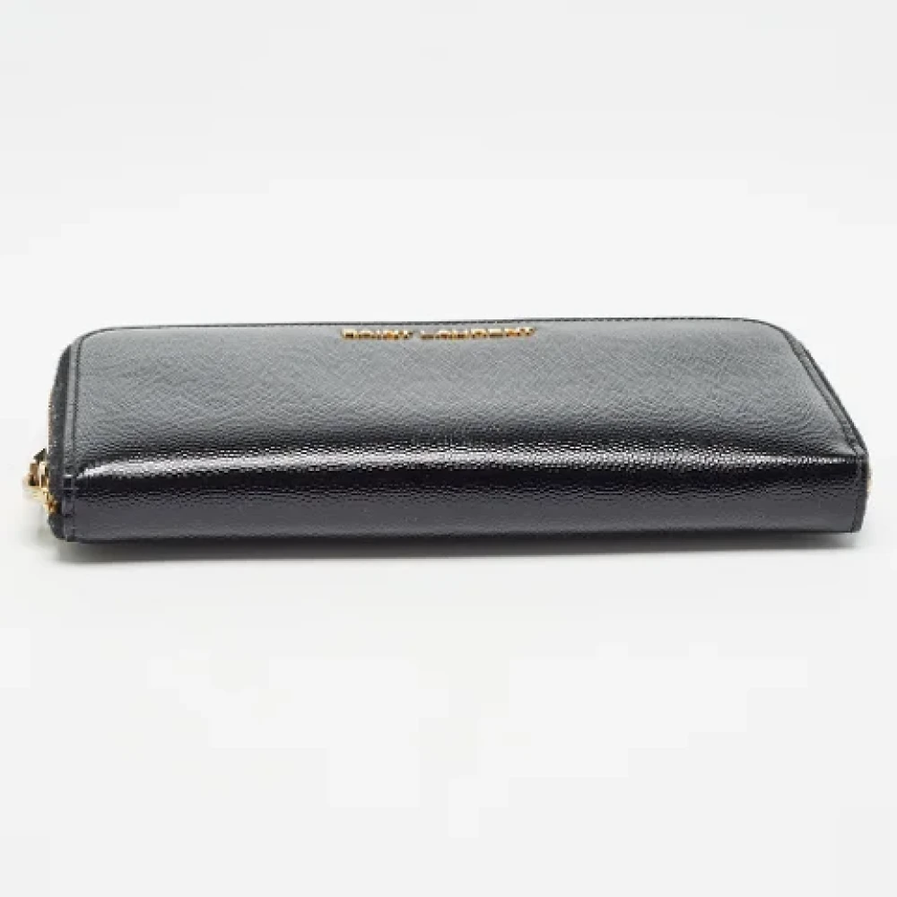 Yves Saint Laurent Vintage Pre-owned Leather wallets Black Dames