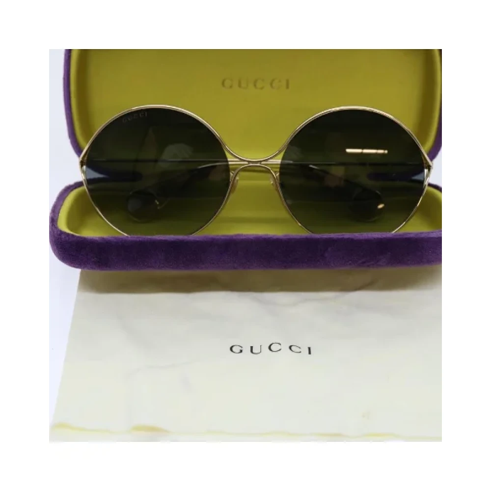Gucci Vintage Pre-owned Metal sunglasses Yellow Dames